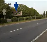 Valla publicitaria en la glorieta del paseo del Progreso de Salamanca, junto al Puente Romano y frente a la Vía Helmántica